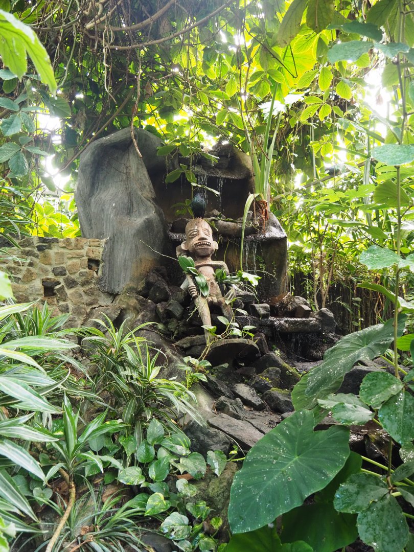 Waterfall and statue in the Tropicalia greenhouse, 2022-06-28