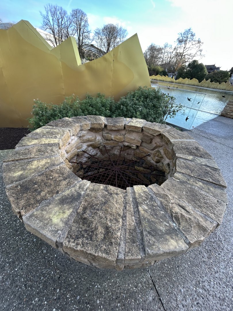 Well at the entrance plaza