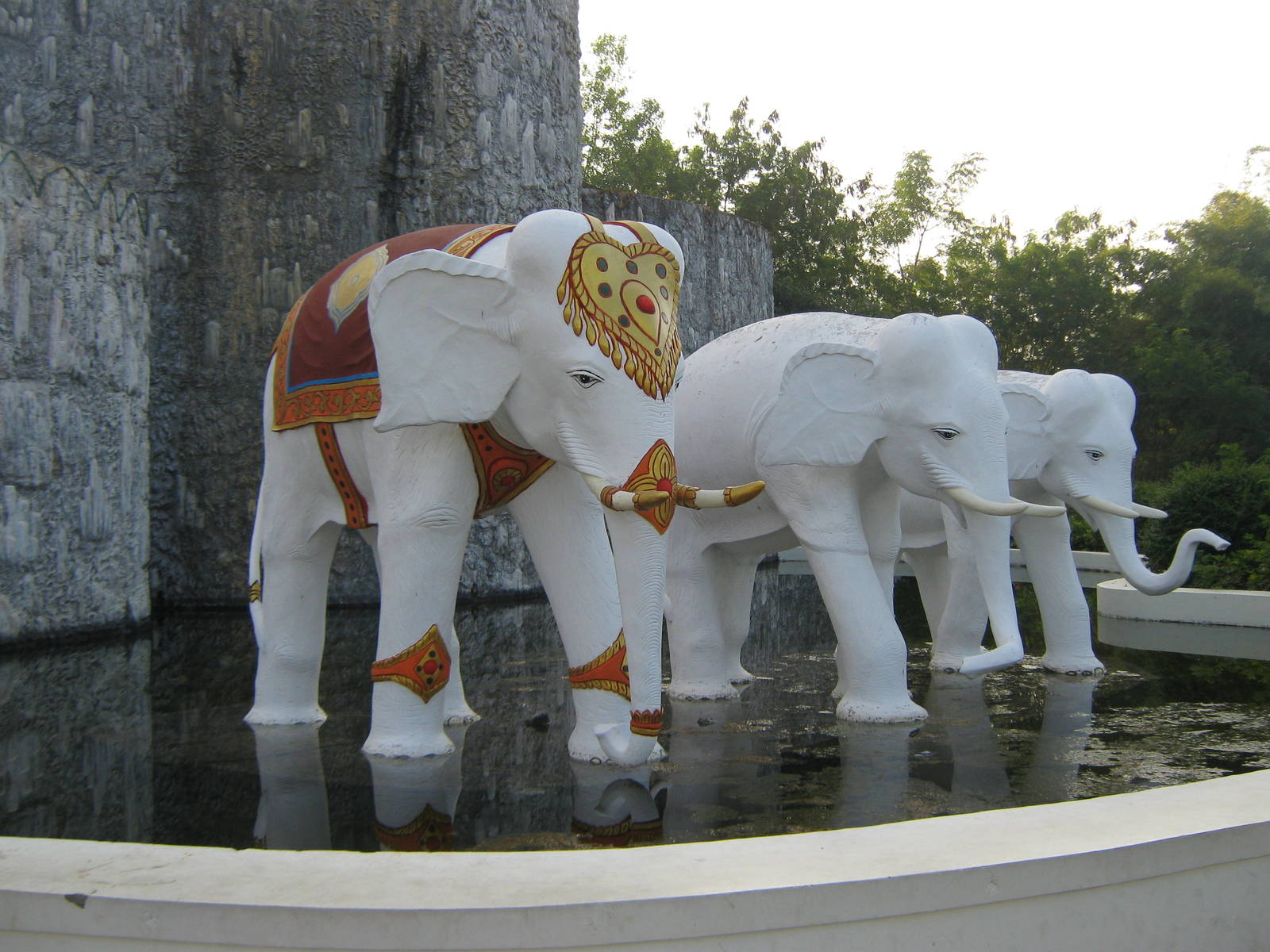 white elephant statues at entrance