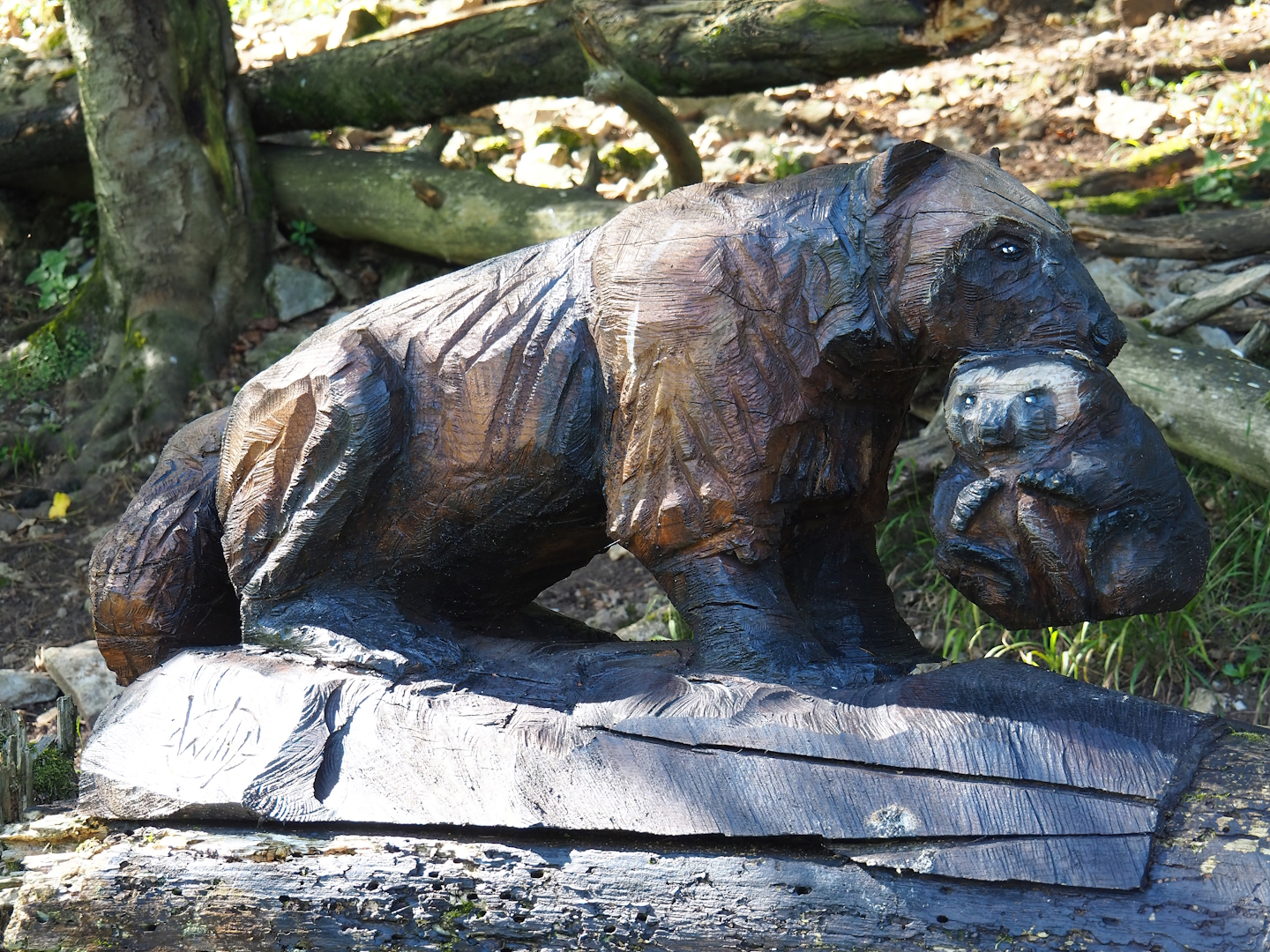 Wolverine with cub wood carving, 2023-09-26