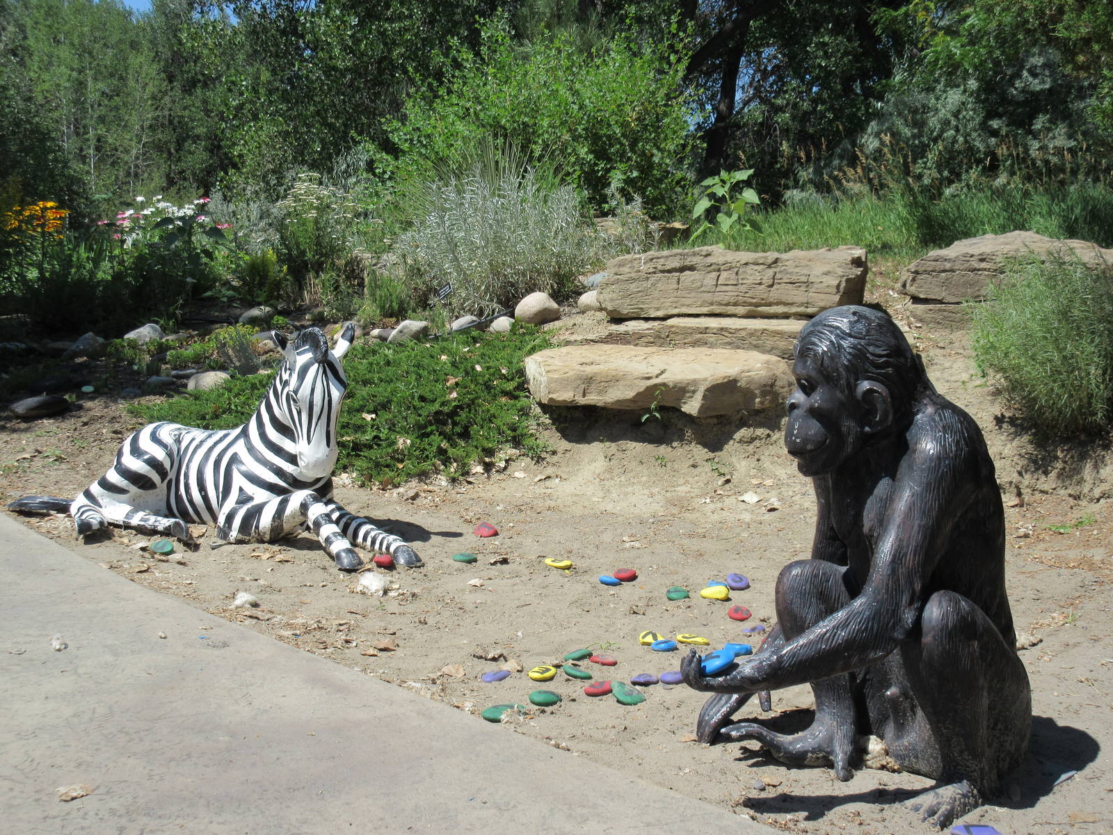 Zebra + Chimpanzee Statues